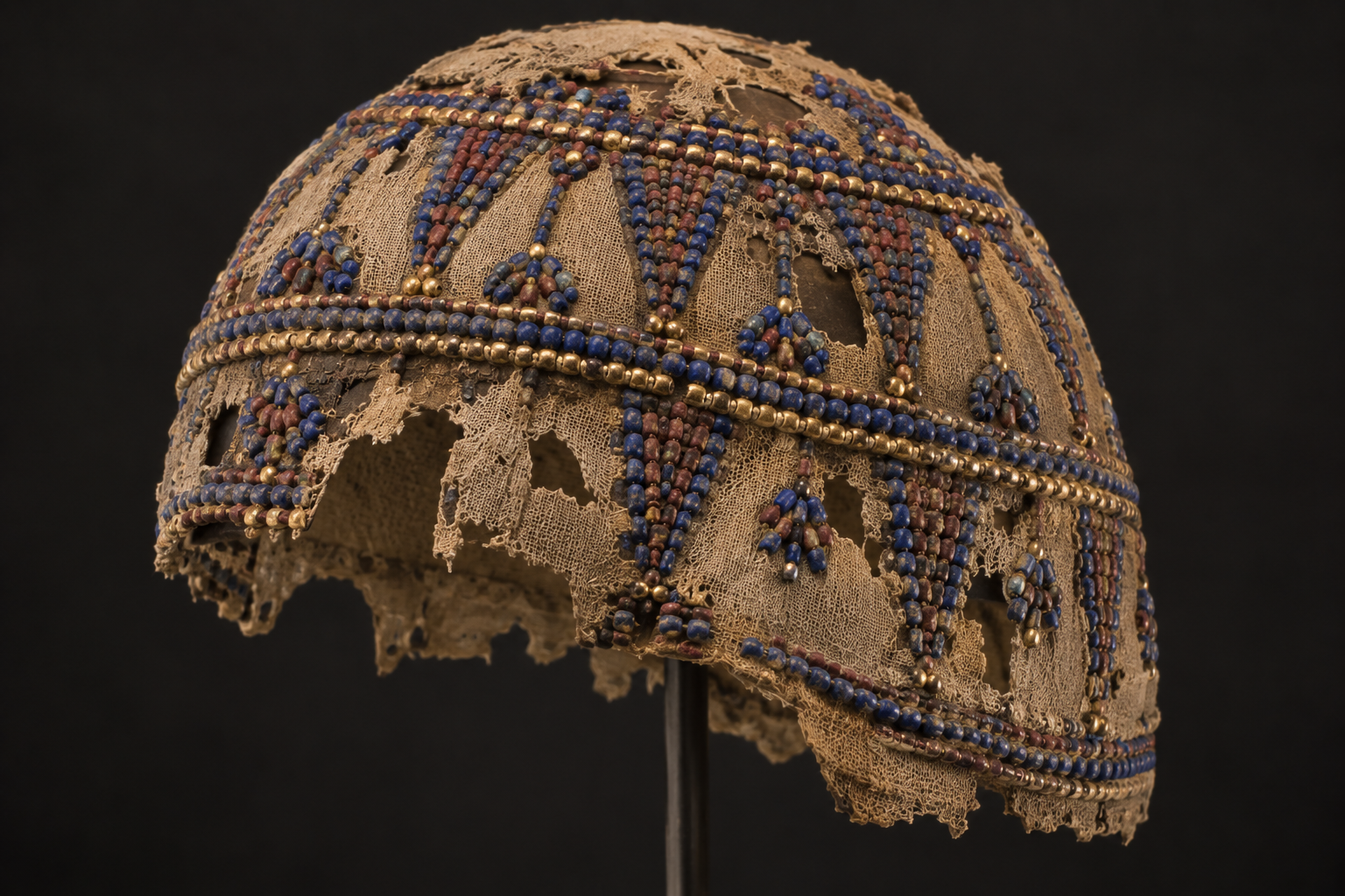 Ancient linen skull-cap documented with Tutankhamun's mummy